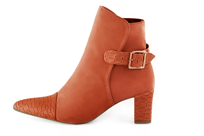 Terracotta orange women's ankle boots with buckles at the back. Tapered toe. Medium block heels. Profile view - Florence KOOIJMAN